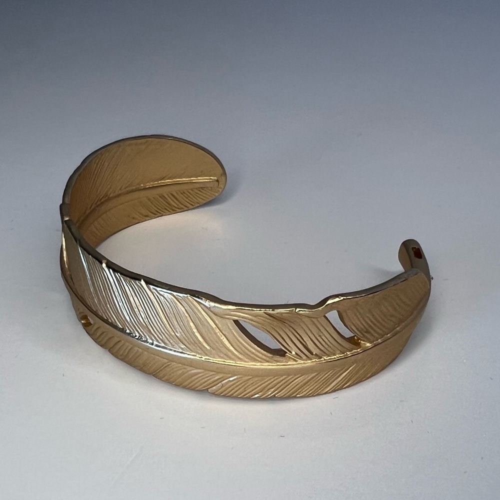 NWOT Gold-Tone Feather Bracelet with Cubic Zirconia
